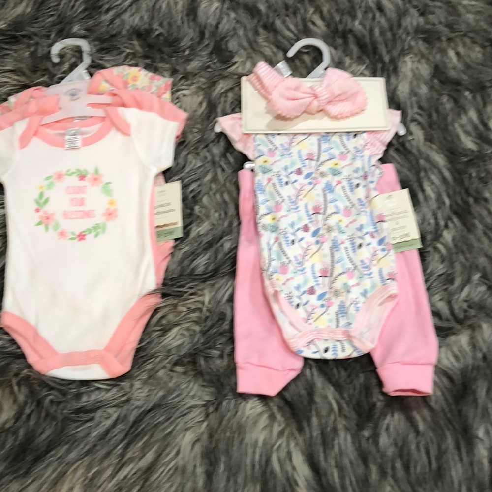Baby Kiss Bundle of girl’s Floral onesie’s and 2 piece set.